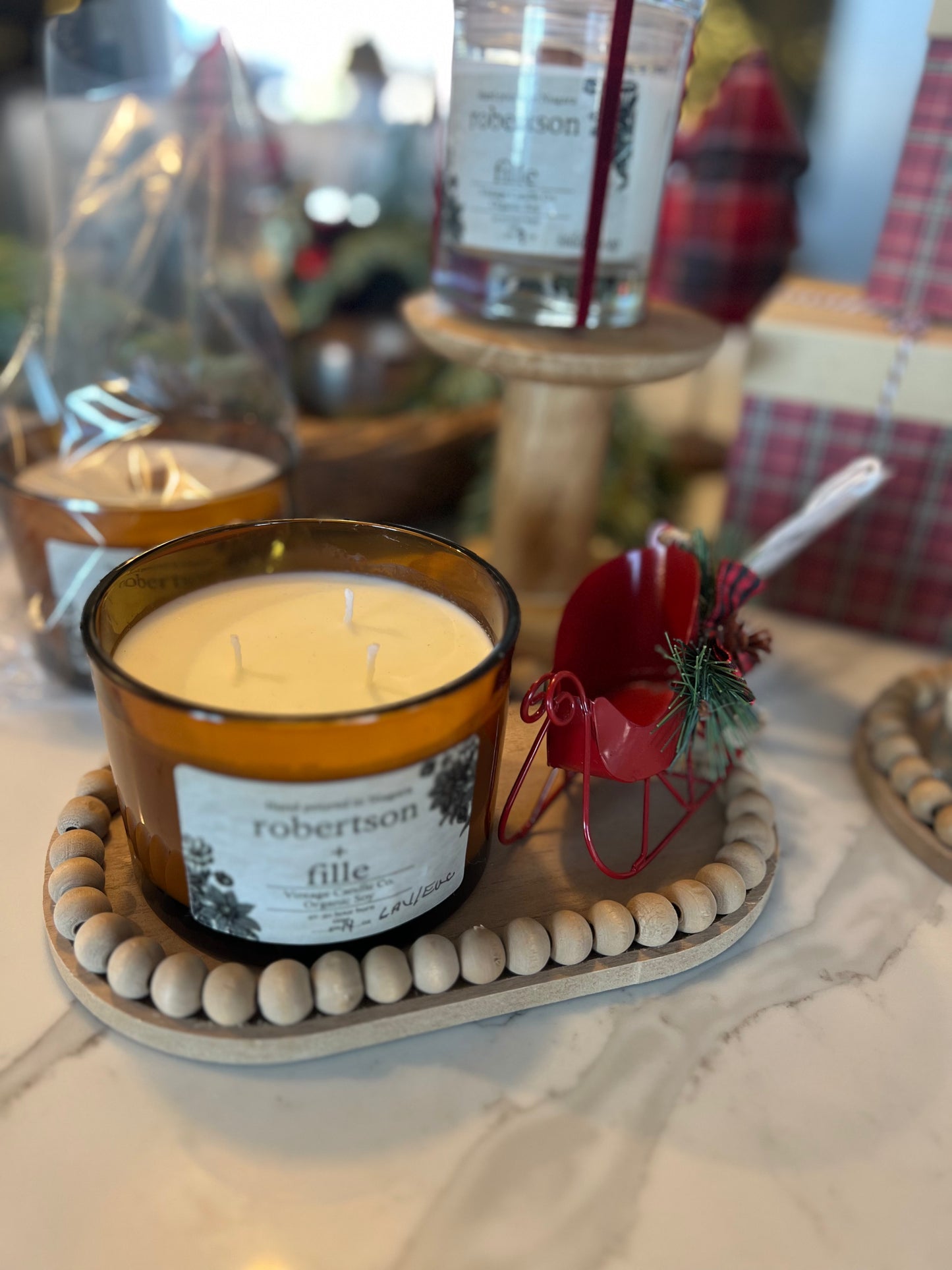 14 oz organic soy wax candle, with seasonal decor detail